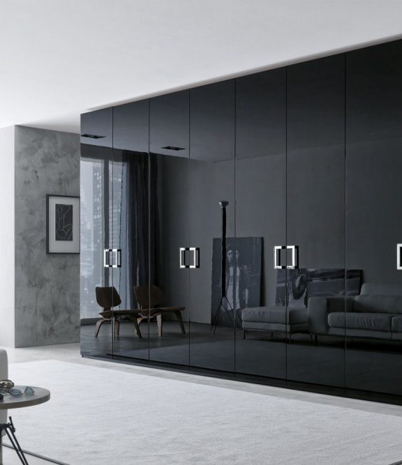 Шафи та стінки для вітальні: види, матеріали та поради з вибору